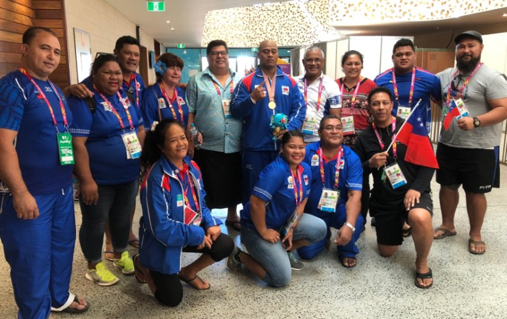 SASNOC President and officials and part of the Samoa Weightlifting Team in a previous international sports competition