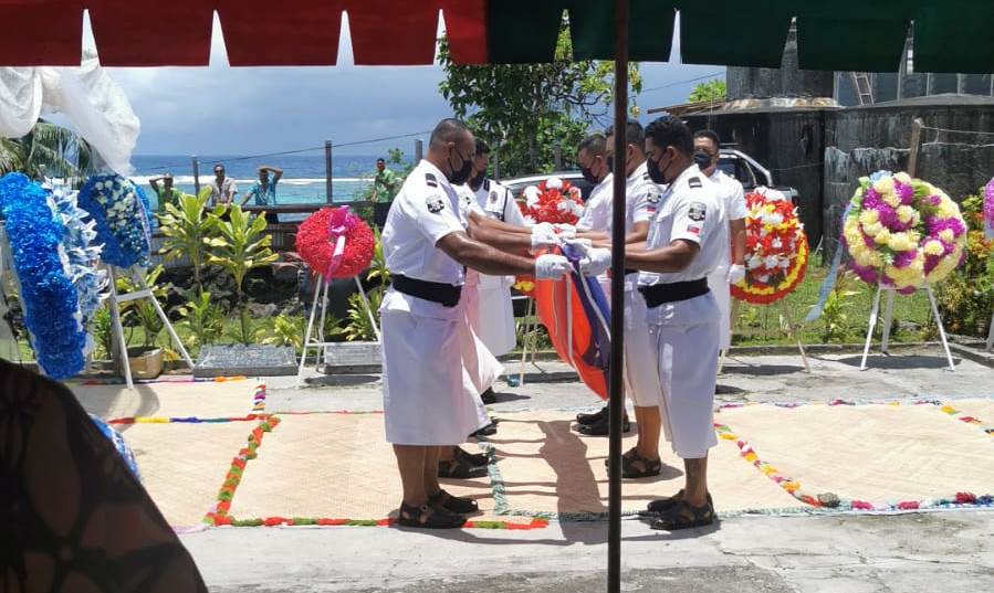 Police Guard of Honour prepare the flag that was presented by the Prime Minister to the former Cabinet Ministers widow in recognition of his service to the Government and people of Samoa.