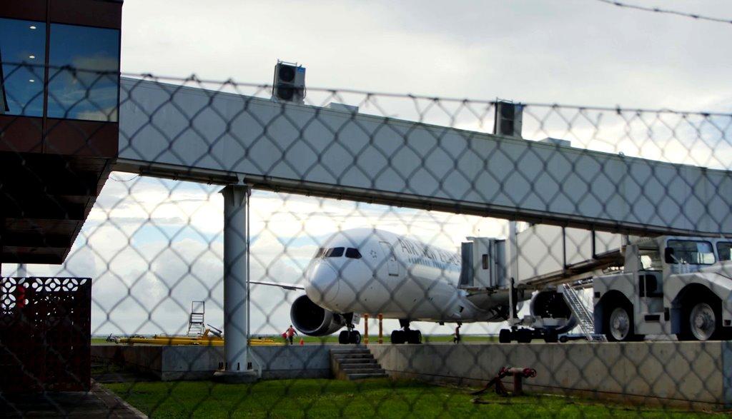 A repatriation flight arrives at Faleolo Airport.