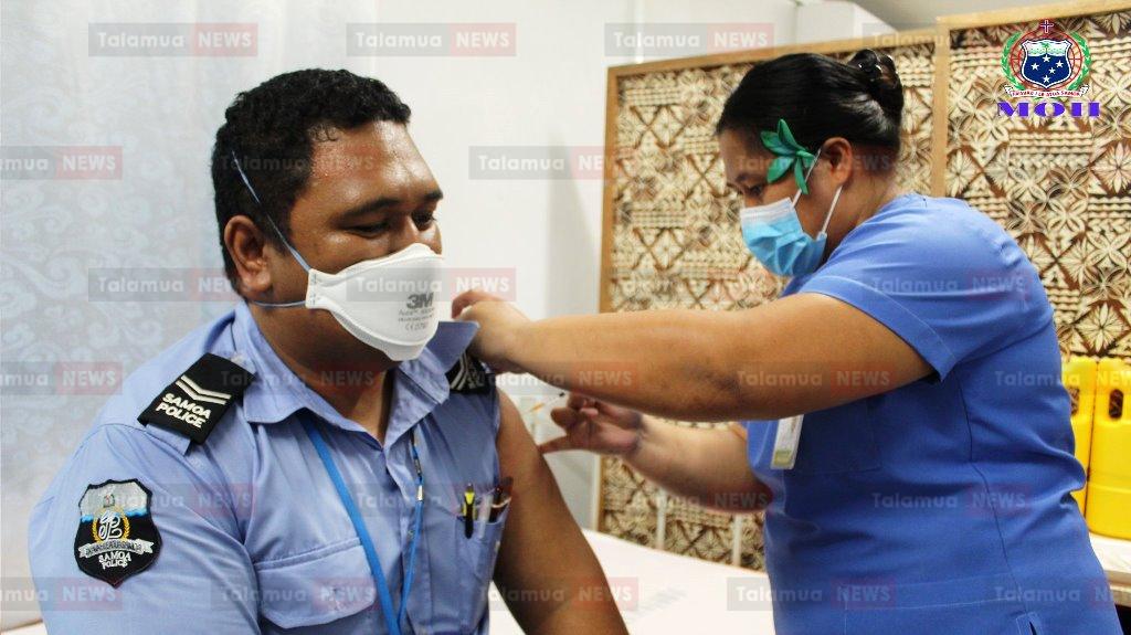 Male Police officer vaccinated