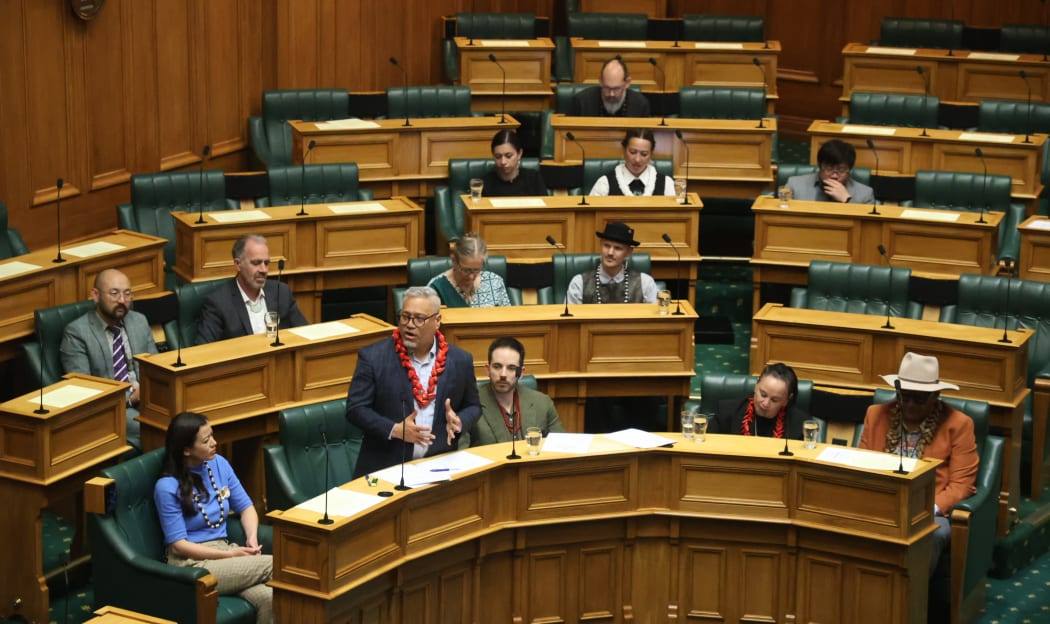 Teanau speaking in parliament