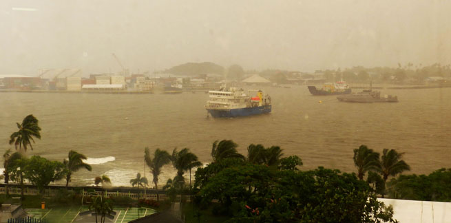 Apia wharf under rain