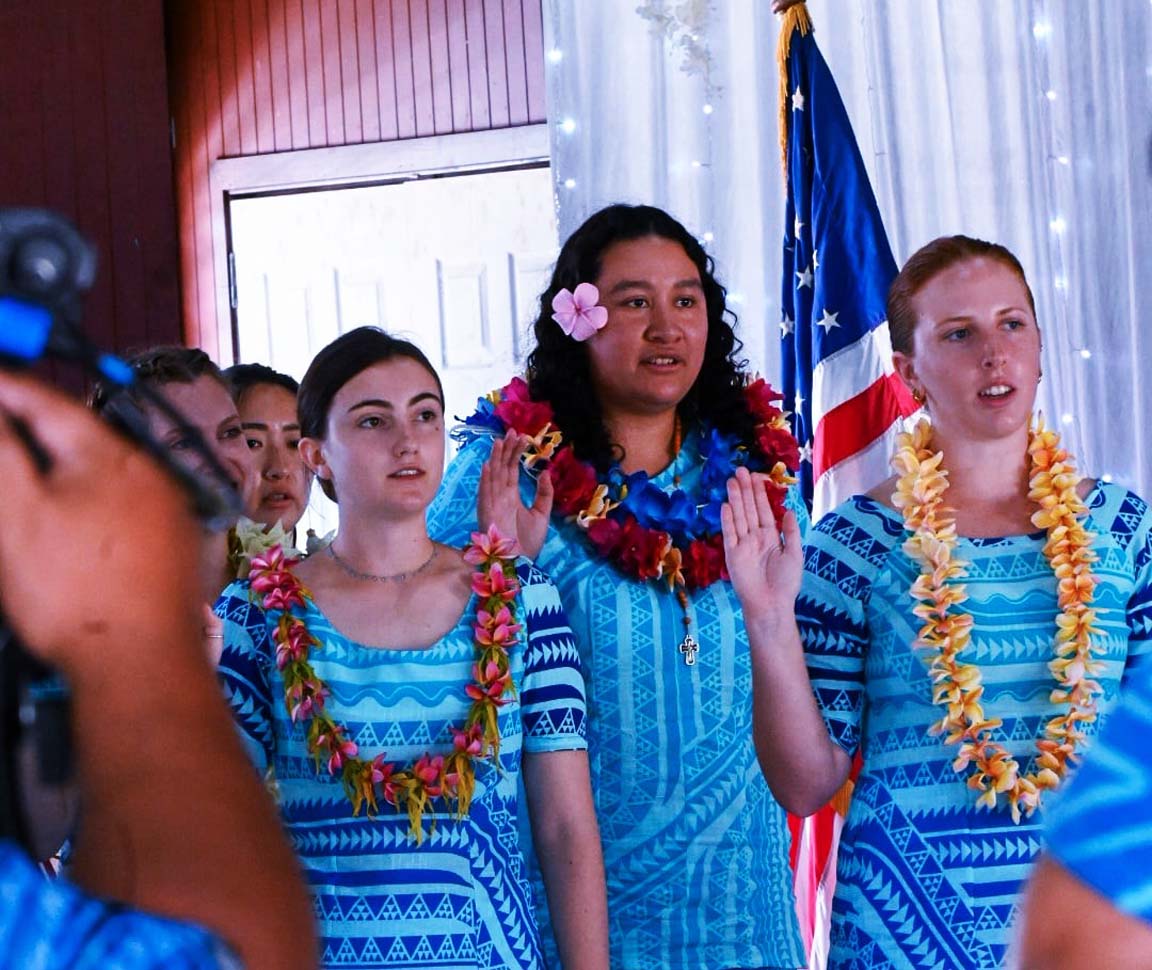 3 PC Volunteers taking the Oath of Service