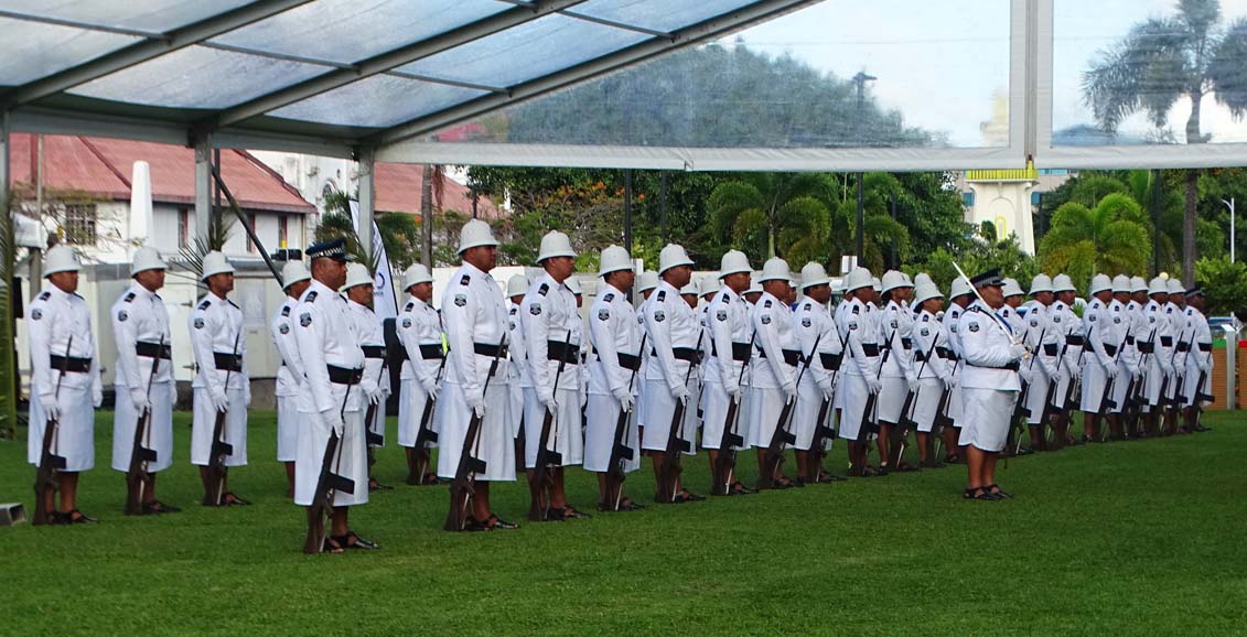 Police Guard armed and in white