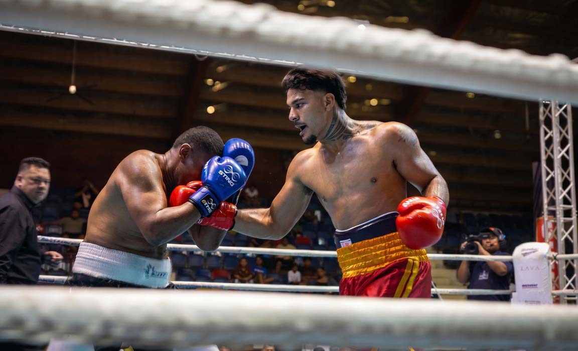 Boxing Jolando Taala lands right on Fiji opponent